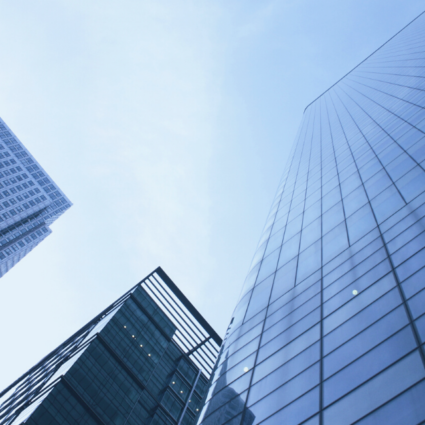 Street view looking up at several skyscrapers.