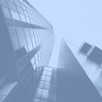 Street view looking up at skyscrapers.