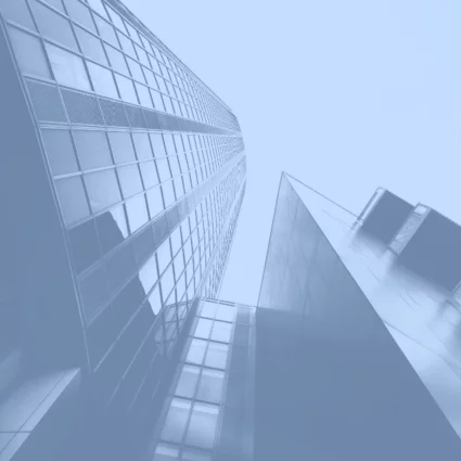 Street view looking up at skyscrapers.
